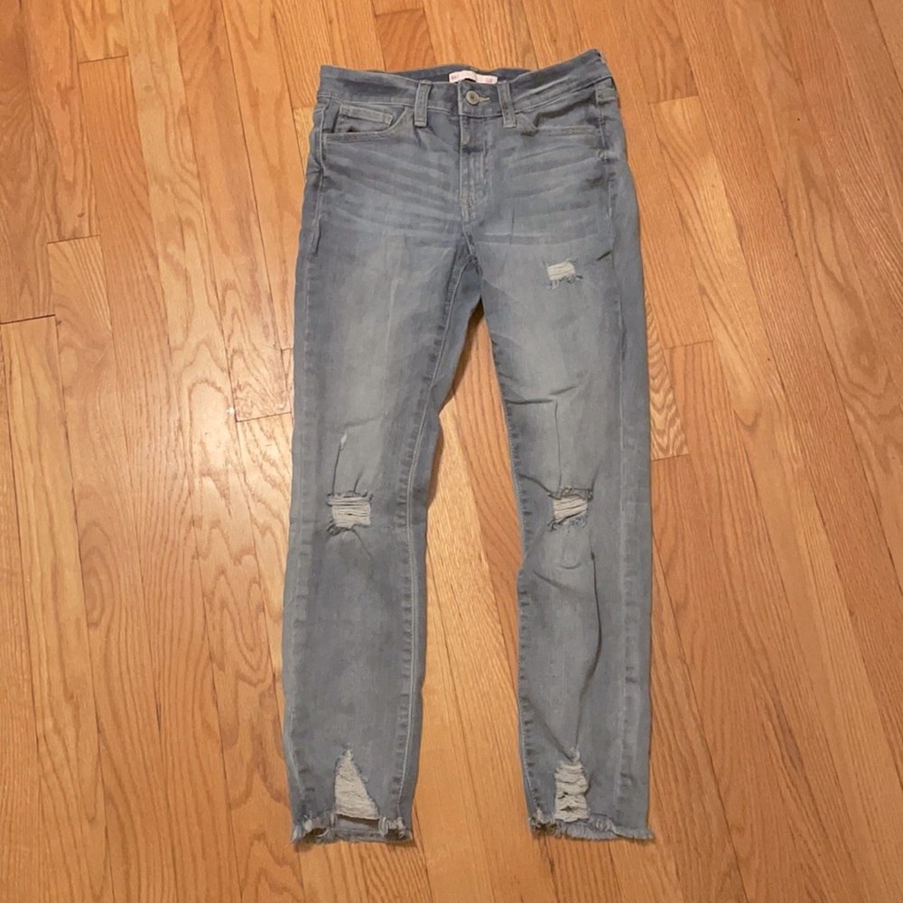 Soft light blue distressed eans